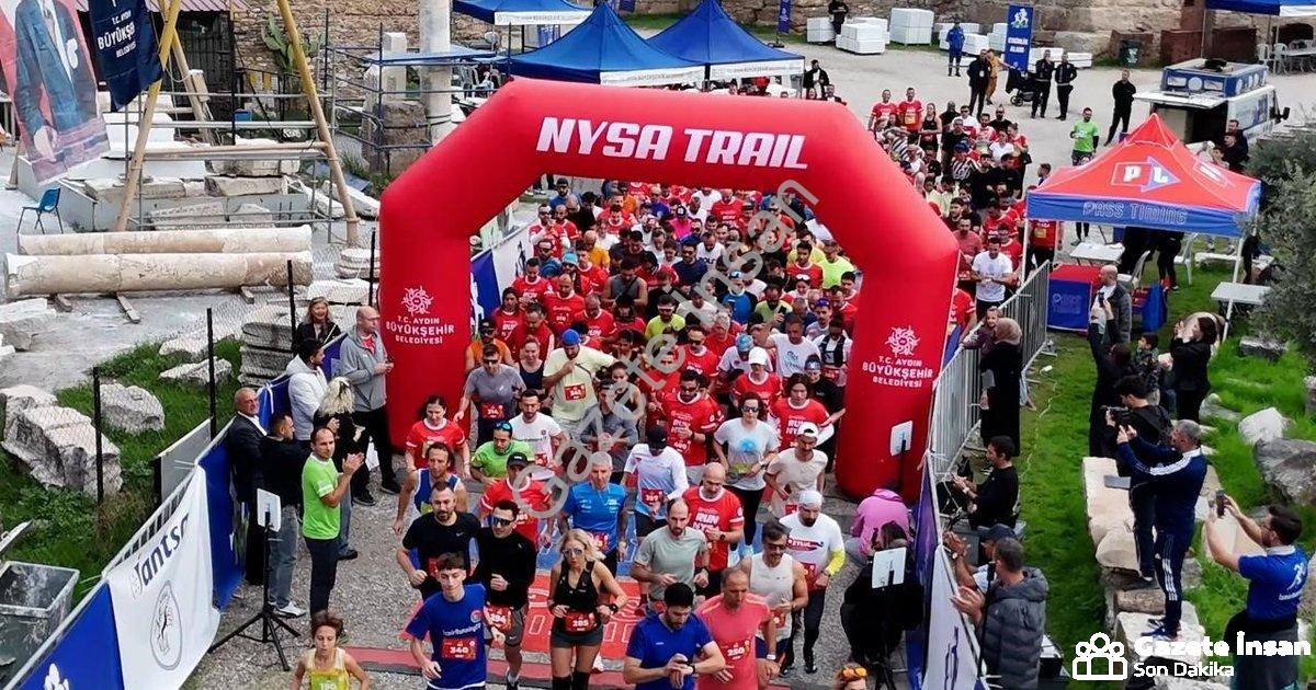 "Aydın'da Tarih ve Spor Buluştu: Nysa'da Unutulmaz Koşu" başlıklı haber için fotorealistik, profesyo
